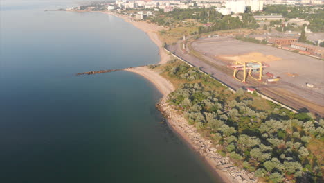 a sea port and a town in the morning sun light