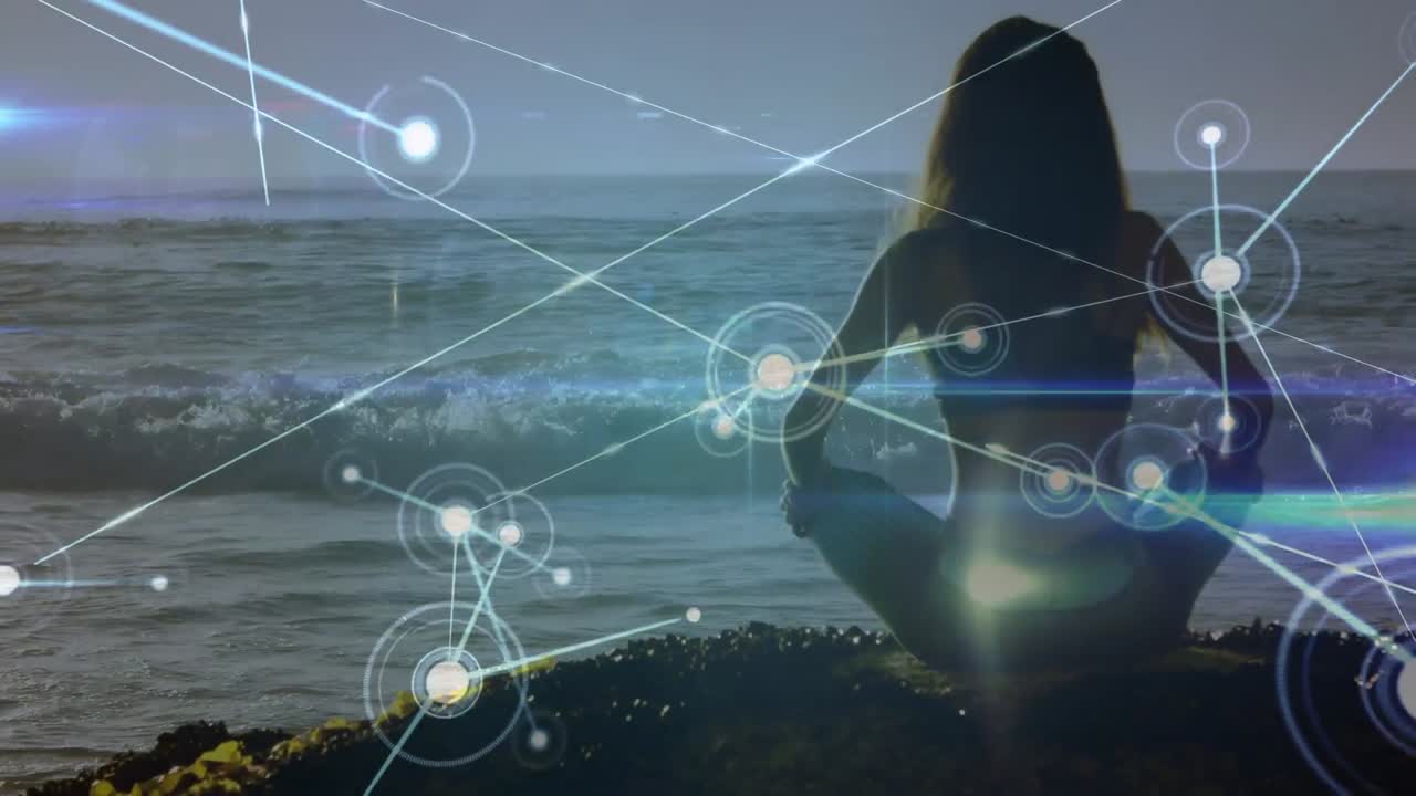 анимация сетей связей над кавказской женщиной, практикующей йогу на пляже