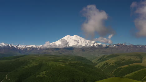 Elbrus-Region.-Flying-over-a-highland-plateau.-Beautiful-landscape-of-nature.-Mount-Elbrus-is-visible-in-the-background.