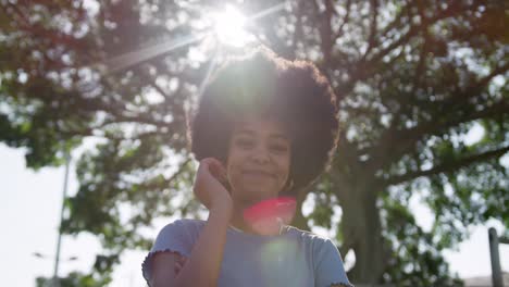 Front-view-of-mixed-race-woman-in-park