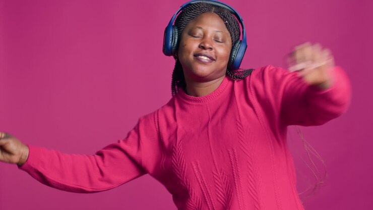 Woman With Earphones Having A Good Time
