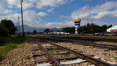 flight over the iconic railroad running through the heart of ciudad salitre, bogotá, colombia