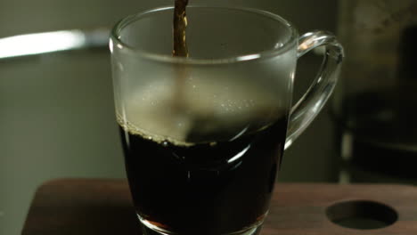 Coffee-Being-Poured-In-A-Clear-Mug