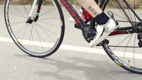 cyclist drives his bicycle at full speed in a highway