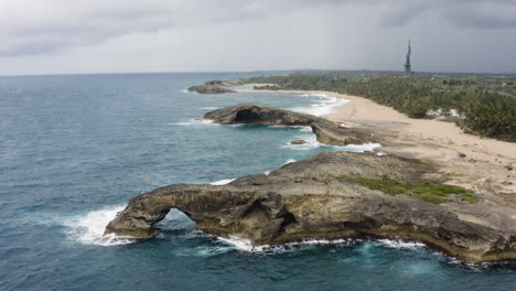 rugged landscape and rocky outcrops along north coast of puerto rico at punta las tunas and cueva del indio - aerial drone shot