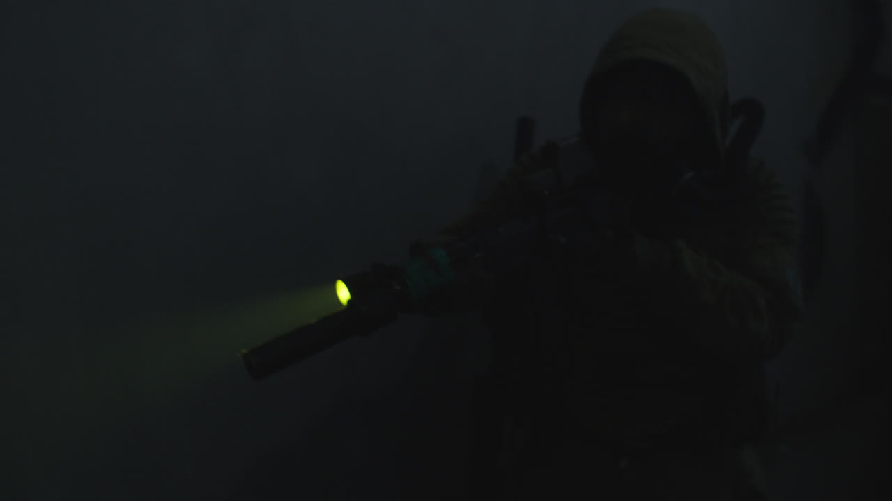 A wounded soldier in the abandoned military complex approaches anomaly