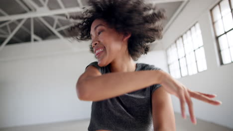dance, smile and energy with a woman in a studio