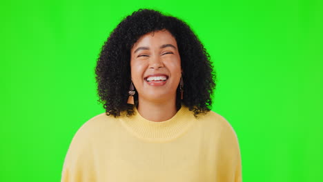 Woman,-face-portrait-and-wink-on-a-green-screen