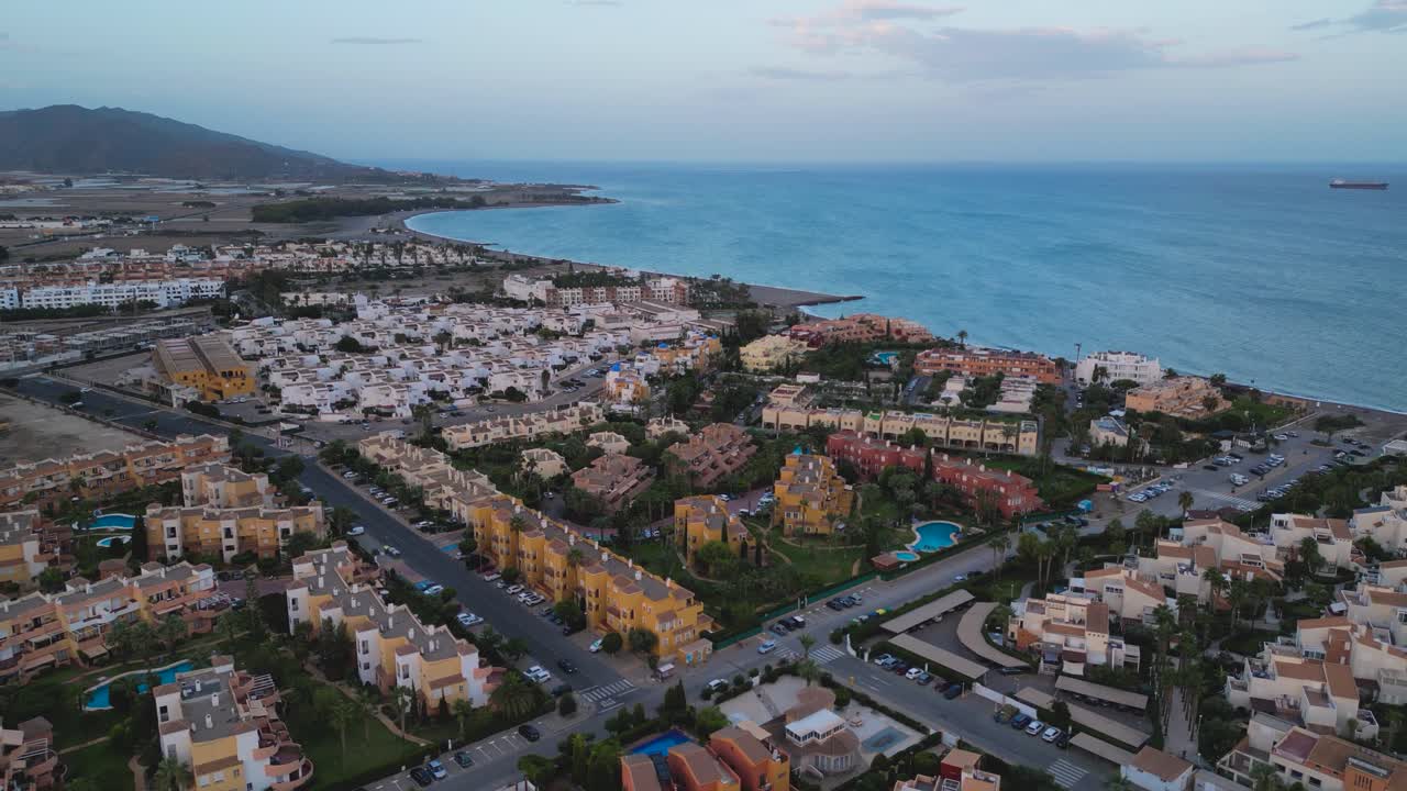 Aerial view of a residential area of Playa nudista Vera in Playa de veras. Almeria Spain - Many residential houses with swimming pool in the shore of mediterranean