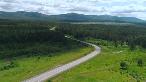 mountain road through forest