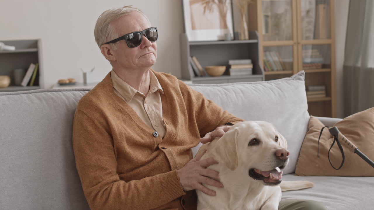 Old Grey Man with Dog at Home