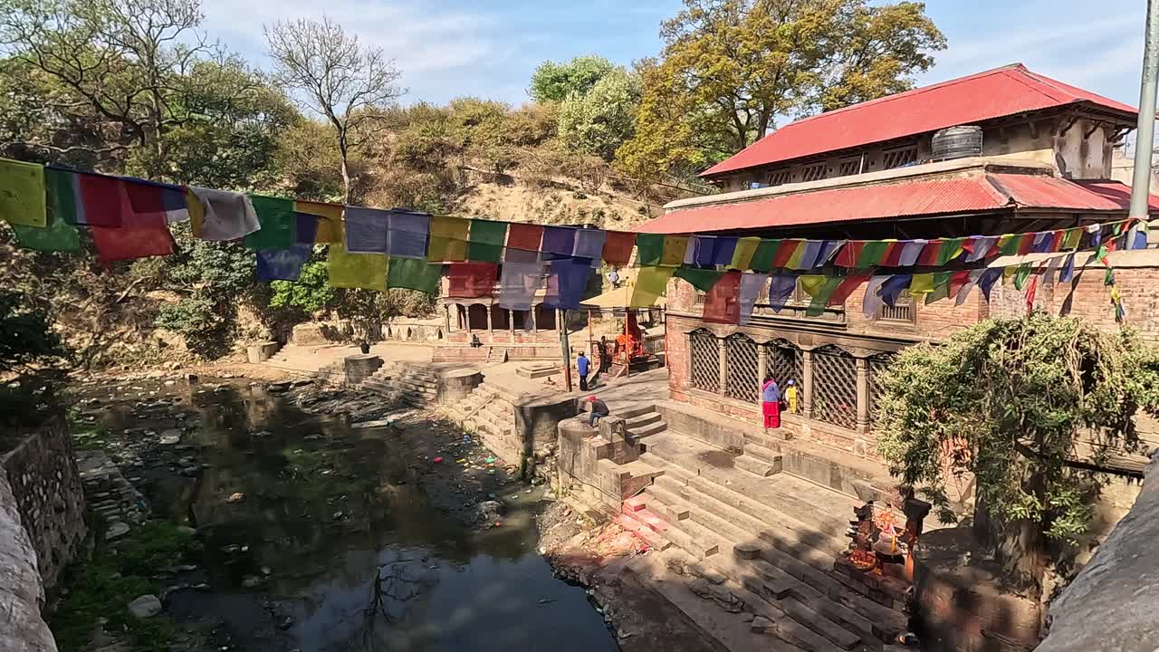 Ancient Temple by the River in Nepal