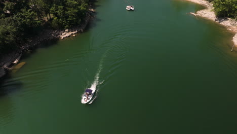 Bird's-eye-view-of-leisure-motor-boats-navigating-Hogscald-Hollow-in-Beaver-lake