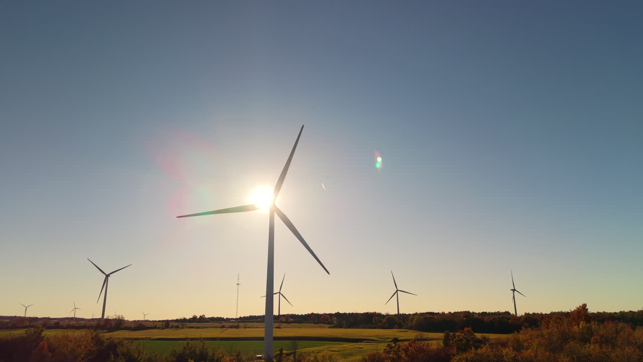 Wind Turbines in Autumn Landscape