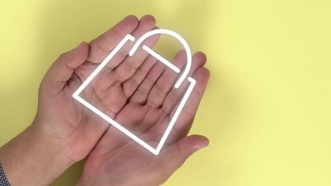 hands of a person opening themselves and animation of a shopping bag appearing on them