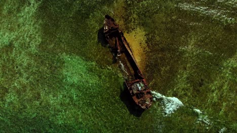 Amazing-bird's-eye-view-of-a-shipwreck-embedded-in-the-sand-on-a-reef-near-the-Caribbean-island-of-Carriacou