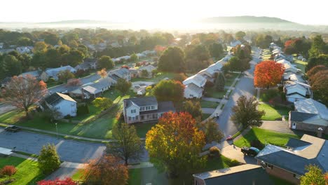 bright sunrise over american neighborhood during autumn morning