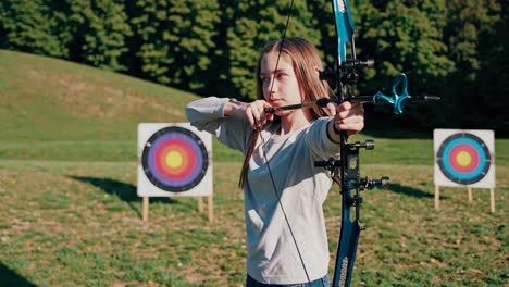 girl practicing archery