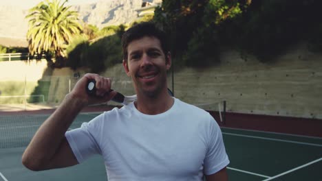 Man-playing-tennis-on-a-sunny-day