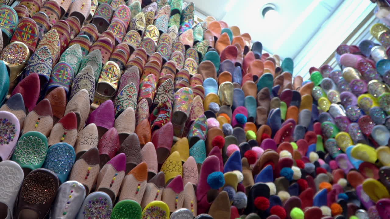 Discover the rich heritage of Morocco with authentic belgha leather shoes in Marrakech's vibrant old medina market