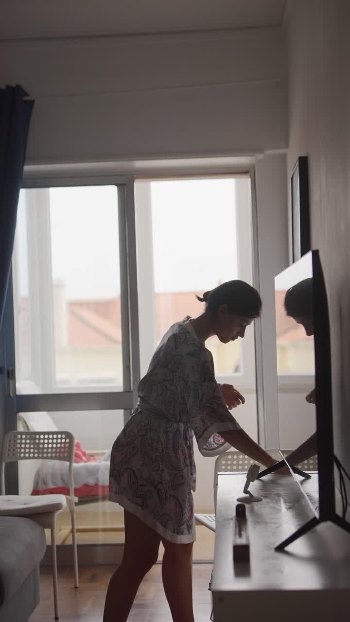 Woman Cleaning in Hotel Room