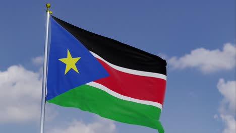 Flag-Of-South-Sudan-Moving-In-The-Wind-With-A-Clear-Blue-Sky-In-The-Background,-Clouds-Slowly-Moving,-Flagpole,-Slow-Motion