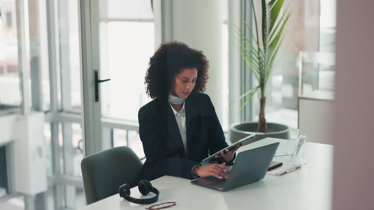 Businesswoman working at her desk in a modern office