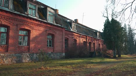 old red brick house, katvari manor in latvia