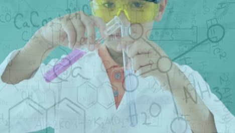 Animation-of-chemistry-data-and-drawings-over-boy-using-test-tubes-in-laboratory