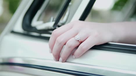 Close-Up-View-Of-Bride's-Hand-With-Wedding-Ring-In-Her-Finger---selective-focus