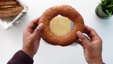 closeup of a person holding a turkish bread