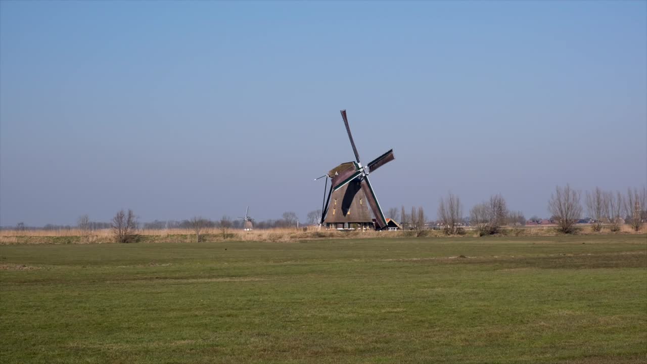 Windmills in a rural field