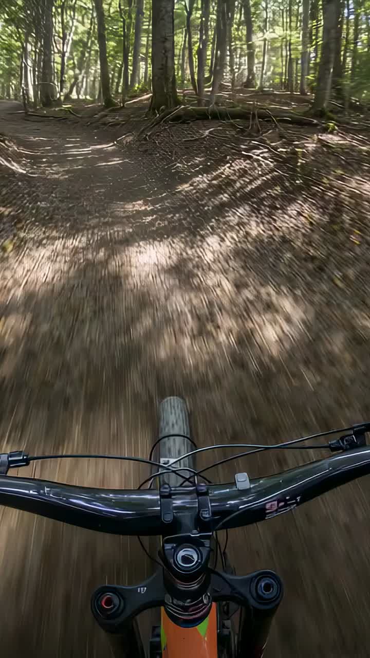 Vertical video: Riding rider steering over rooted trail using blue glove for pedestrian at junction