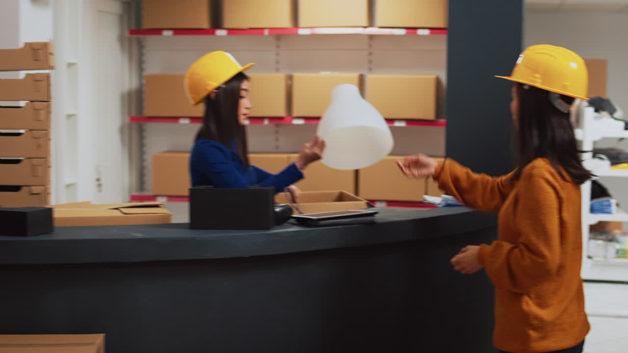 Warehouse workers preparing orders for shipping