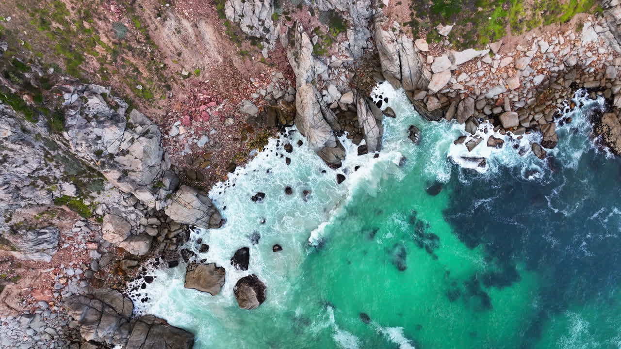 South Africa aerial cinematic drone Coastline Chapman Peak Noordhoek Cape Town Hout Bay Fish Hoek Good Hope Simon's Town stunning aqua deep blue water waves crashing rugged reef rocks green up motion