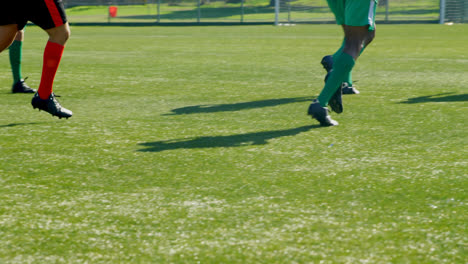 Players-playing-soccer-in-the-field-4k