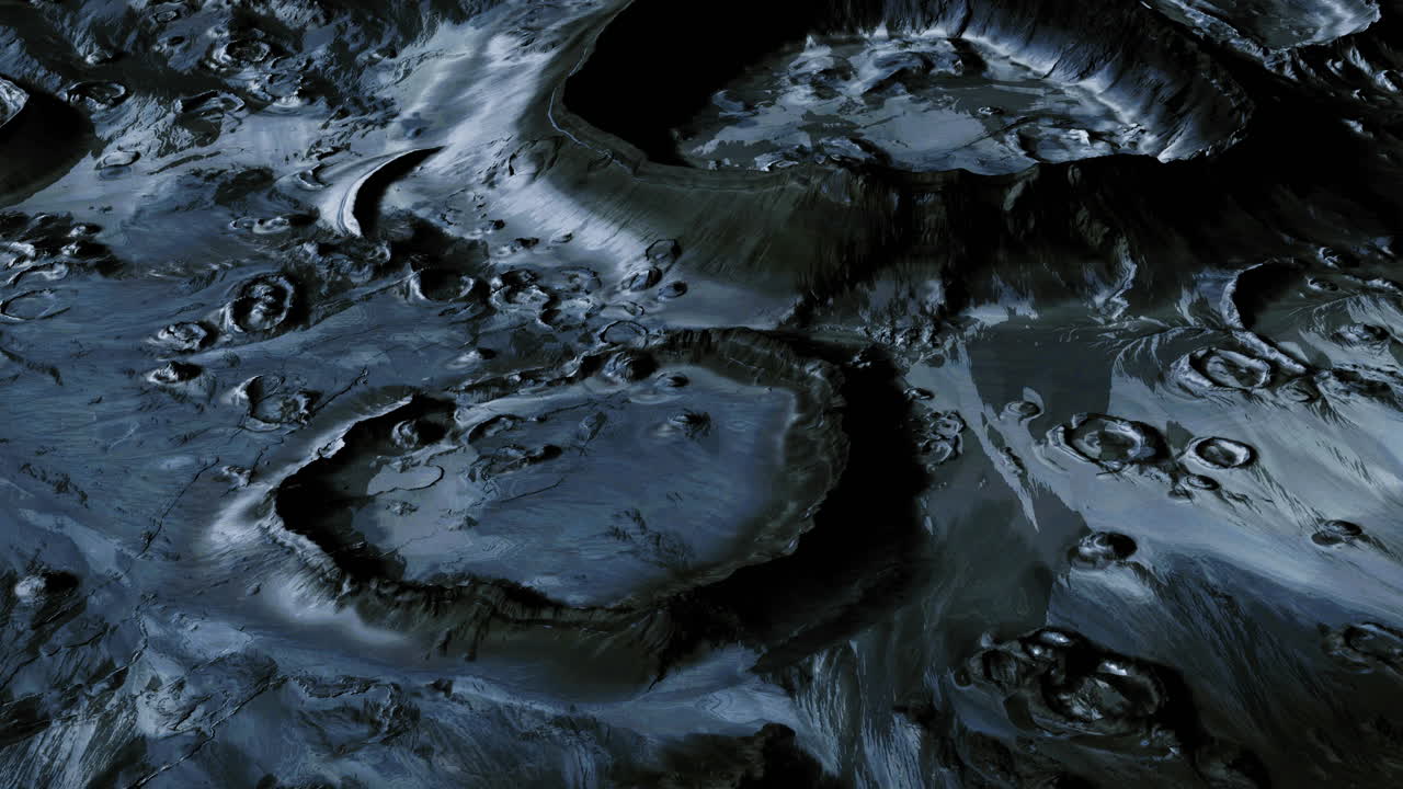 Surface features of the moon showcasing craters and rugged terrain