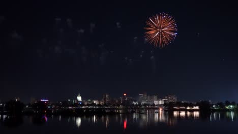 harrisburg, pennsylvania - july 4, 2022: fireworks over the capital city of harrisburg, pennsylvania from across the susquehanna river