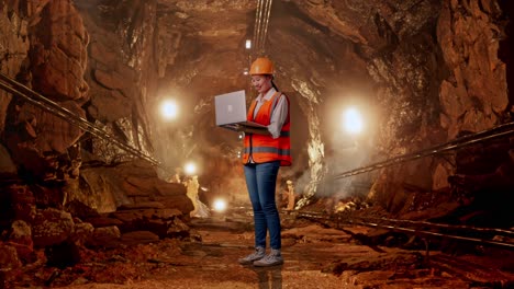 female engineer working in a mine tunnel