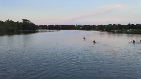 aerial view of group of kayakers enjoying outdoors during summer time in lake of the isles, minneapolis