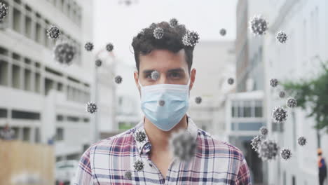 animation of virus cells over biracial man wearing face mask