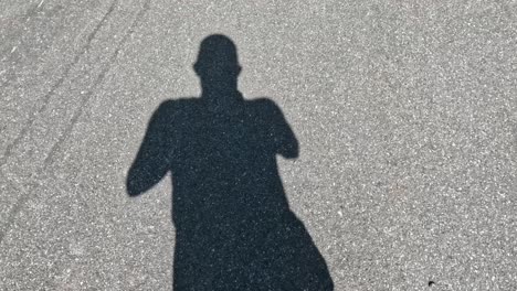 a person's shadow changes during movement.