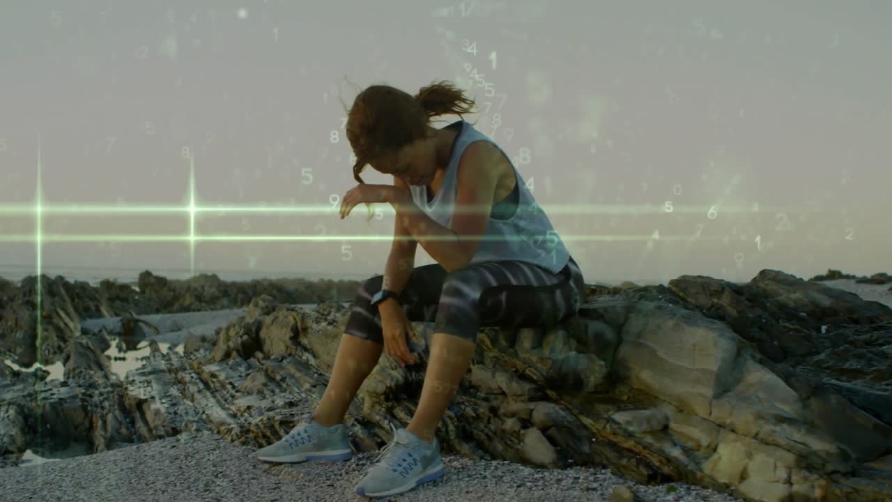 Woman sitting on rock, checking watch, slumping, rubbing eyes, green band overlay tracking fitness