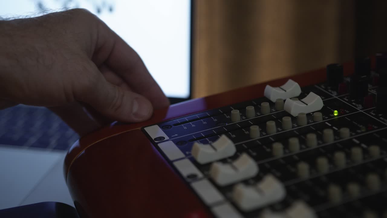 Turning up volume on a mixing board