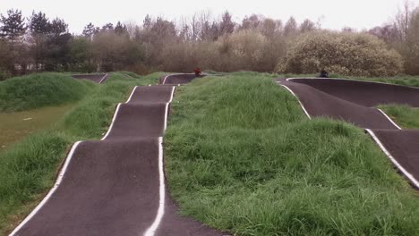 Eboarding-footage-around-a-BMX-pump-track