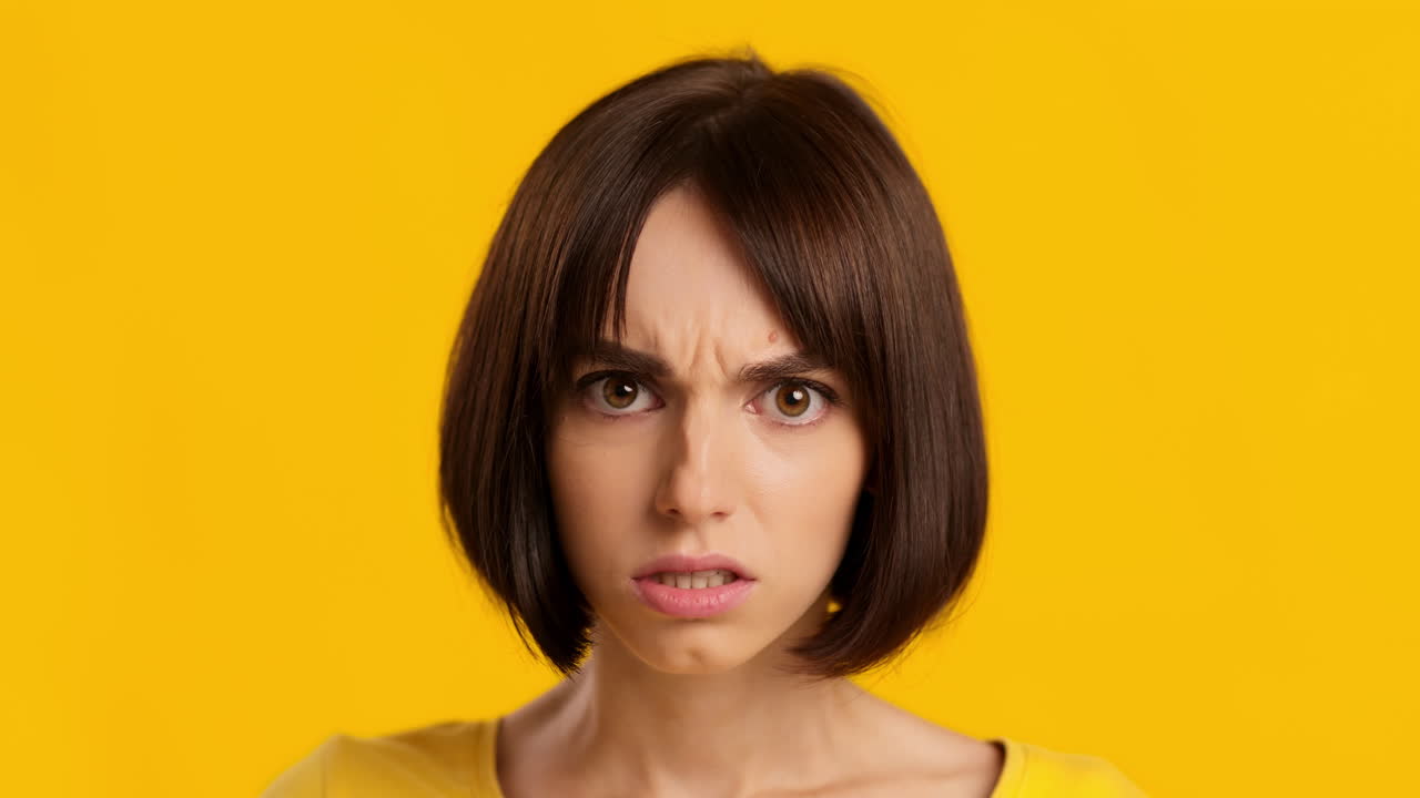 Woman with an expression of confusion or doubt