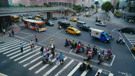 taipei, taiwan - a busy street in xinyi financial district of taipei city in the late evening