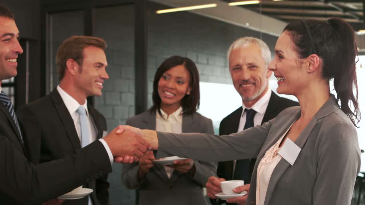 Business people having a handshake 