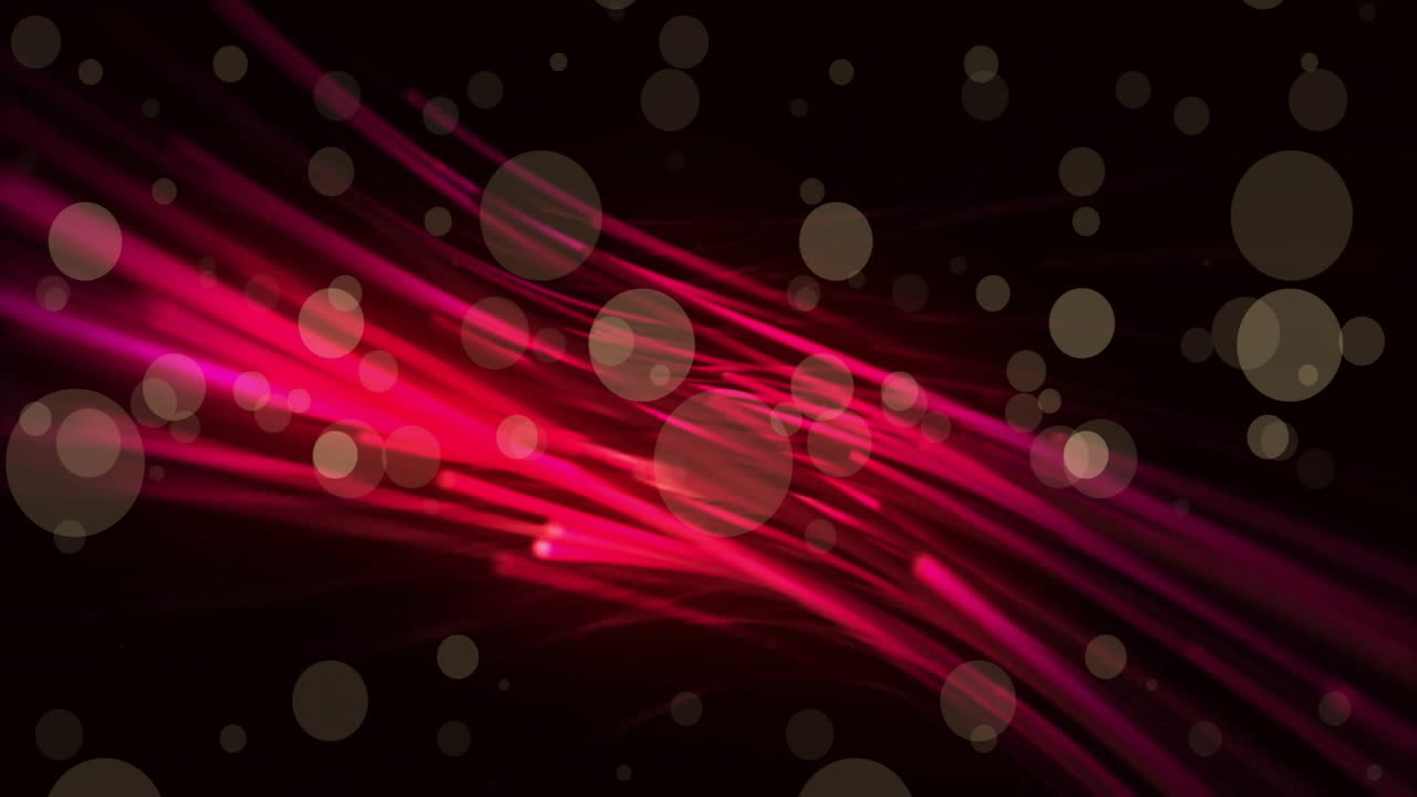 Animation of light spots over red trails on black background