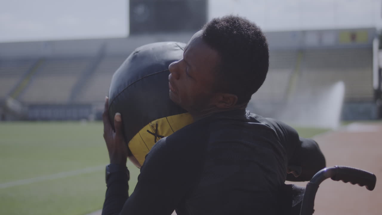 Disabled athlete training in a stadium